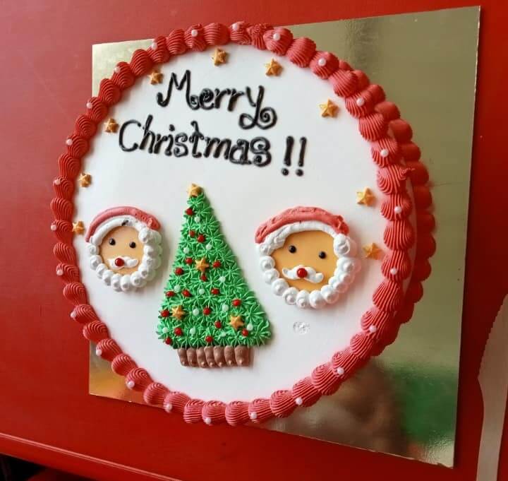 Preschool children celebrating Christmas with decorations, gifts, and festive attire.