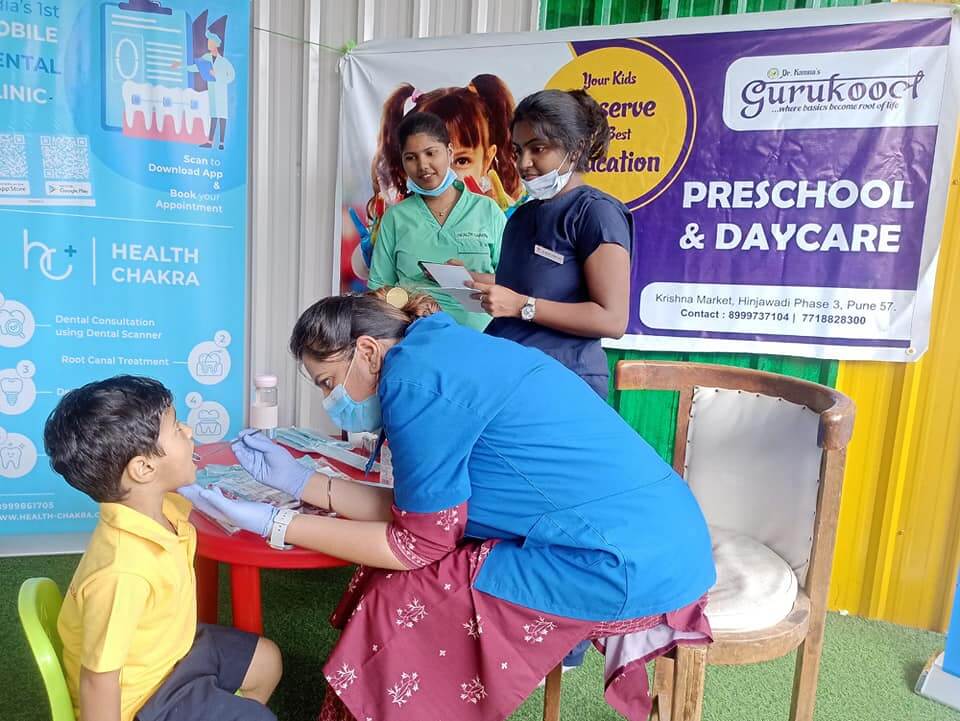 Students undergoing a dental checkup at Dr. Kamna's Gurukool Preschool.