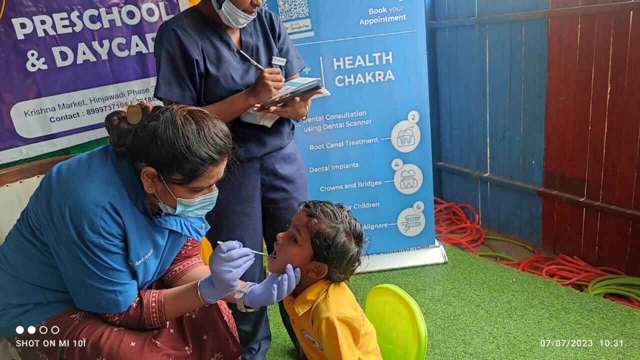 Students undergoing a dental checkup at Dr. Kamna's Gurukool Preschool.