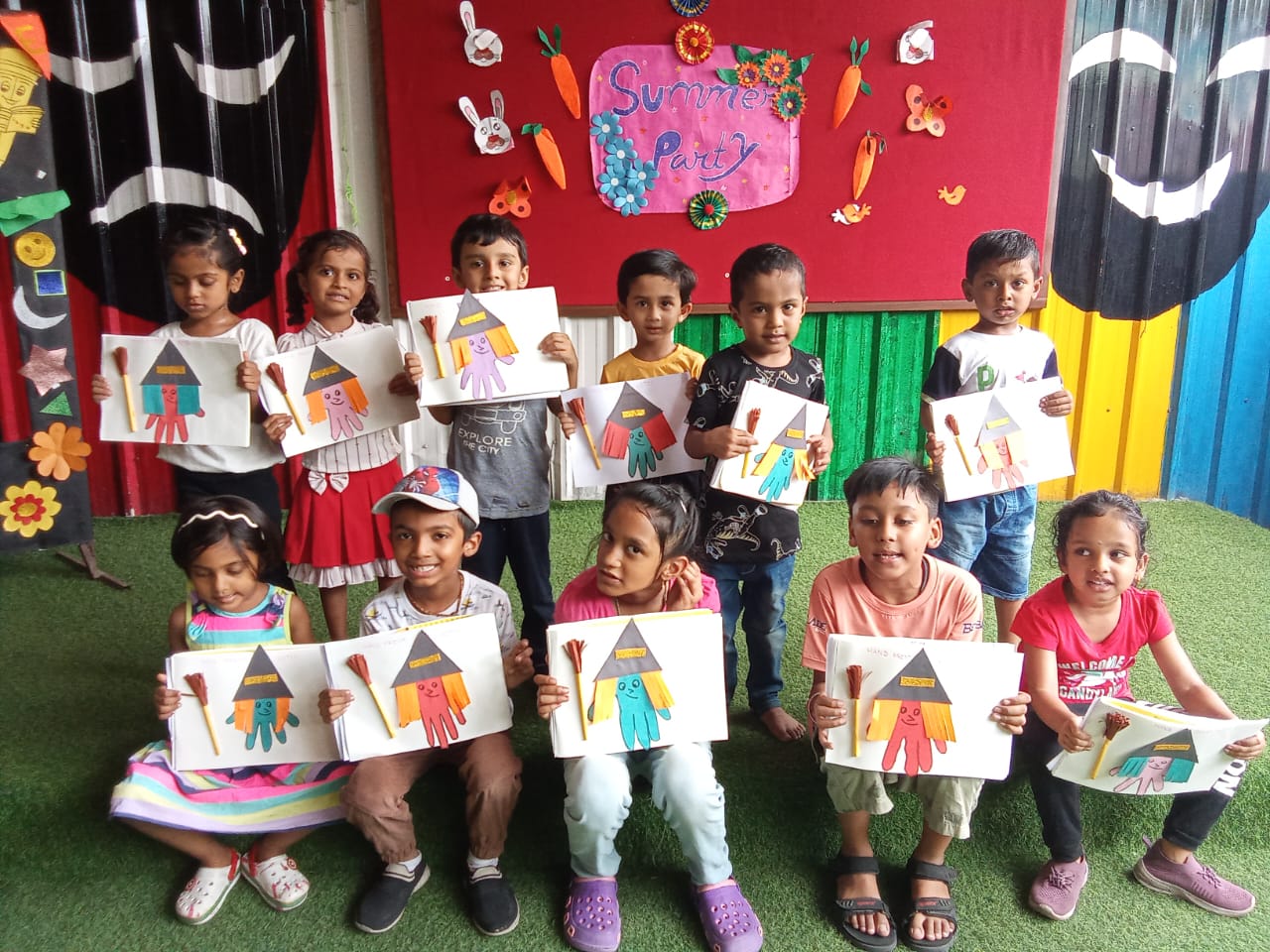 Students and teachers at Dr. Kamna's Gurukool Preschool celebrating a fun-filled summer party with games, music, and activities.